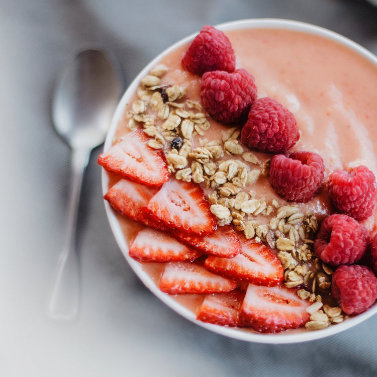 oats and raspberries in a bowl