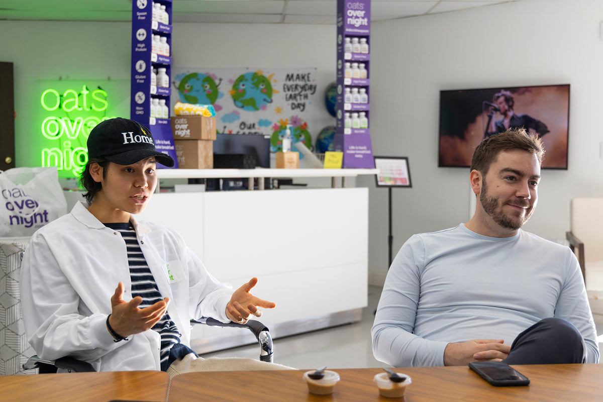 Sean Lew discussing with founder Brian Tate